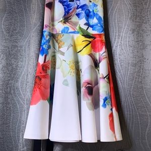 Ted baker London with flowers design. Size 1 juniors. used one time.